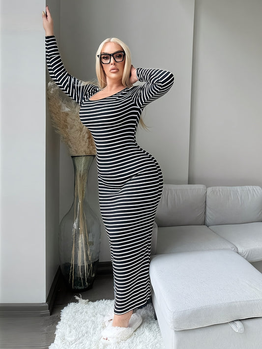 Plus size woman in a full dress black and white striped
